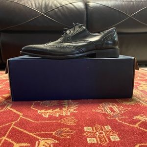 All black leather shoes.